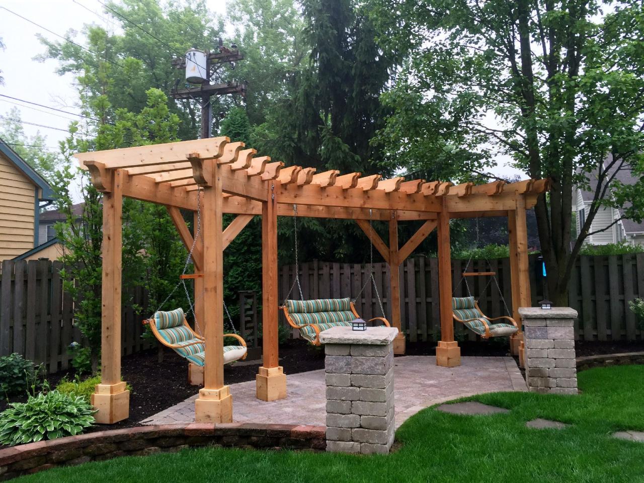 Wooden pergola with swing