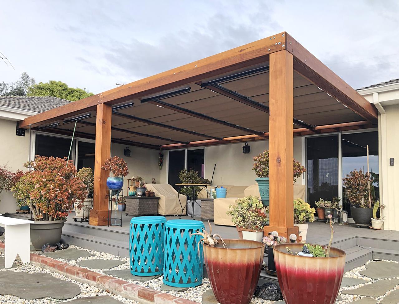 Wooden pergola with retractable canopy