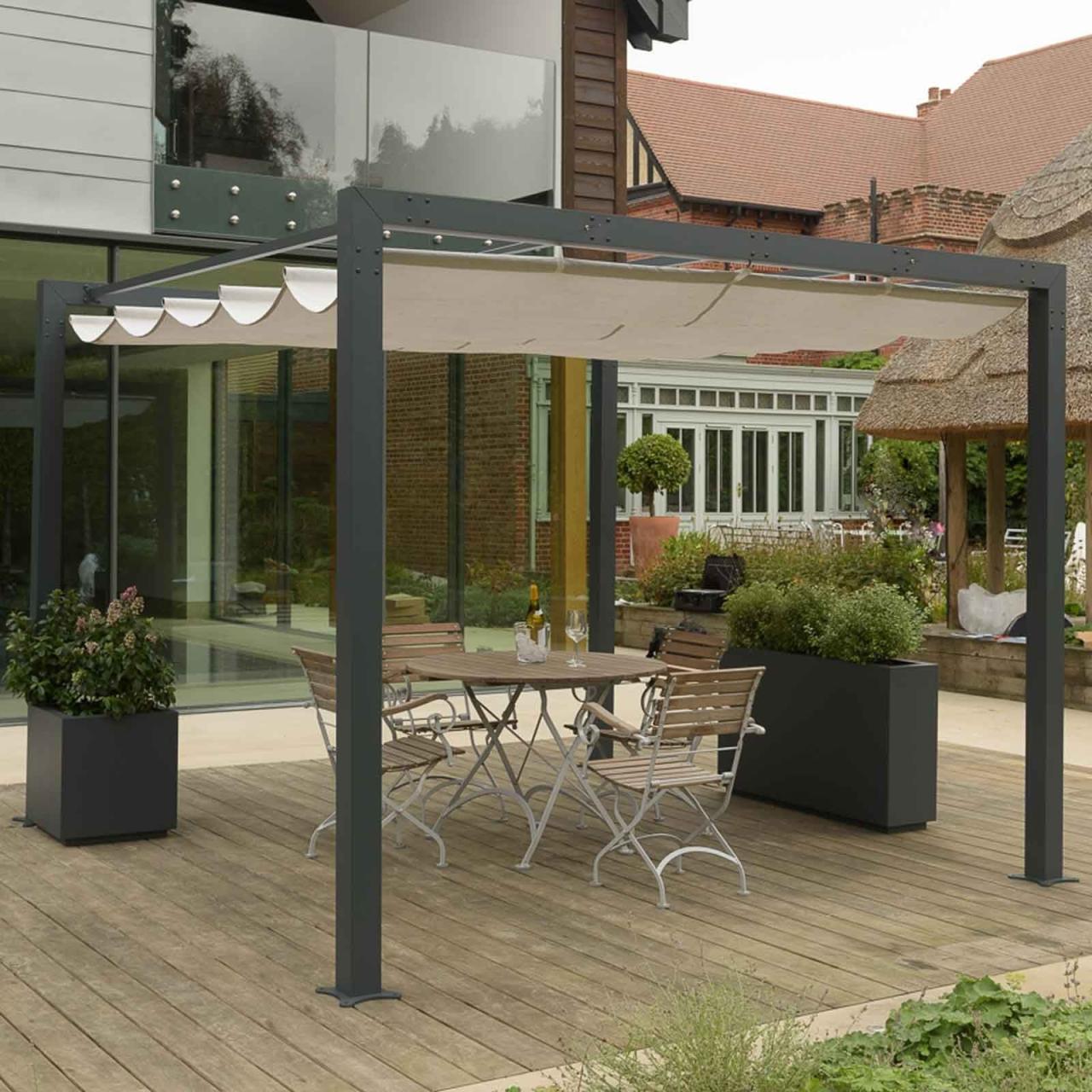 Wooden pergola with retractable canopy