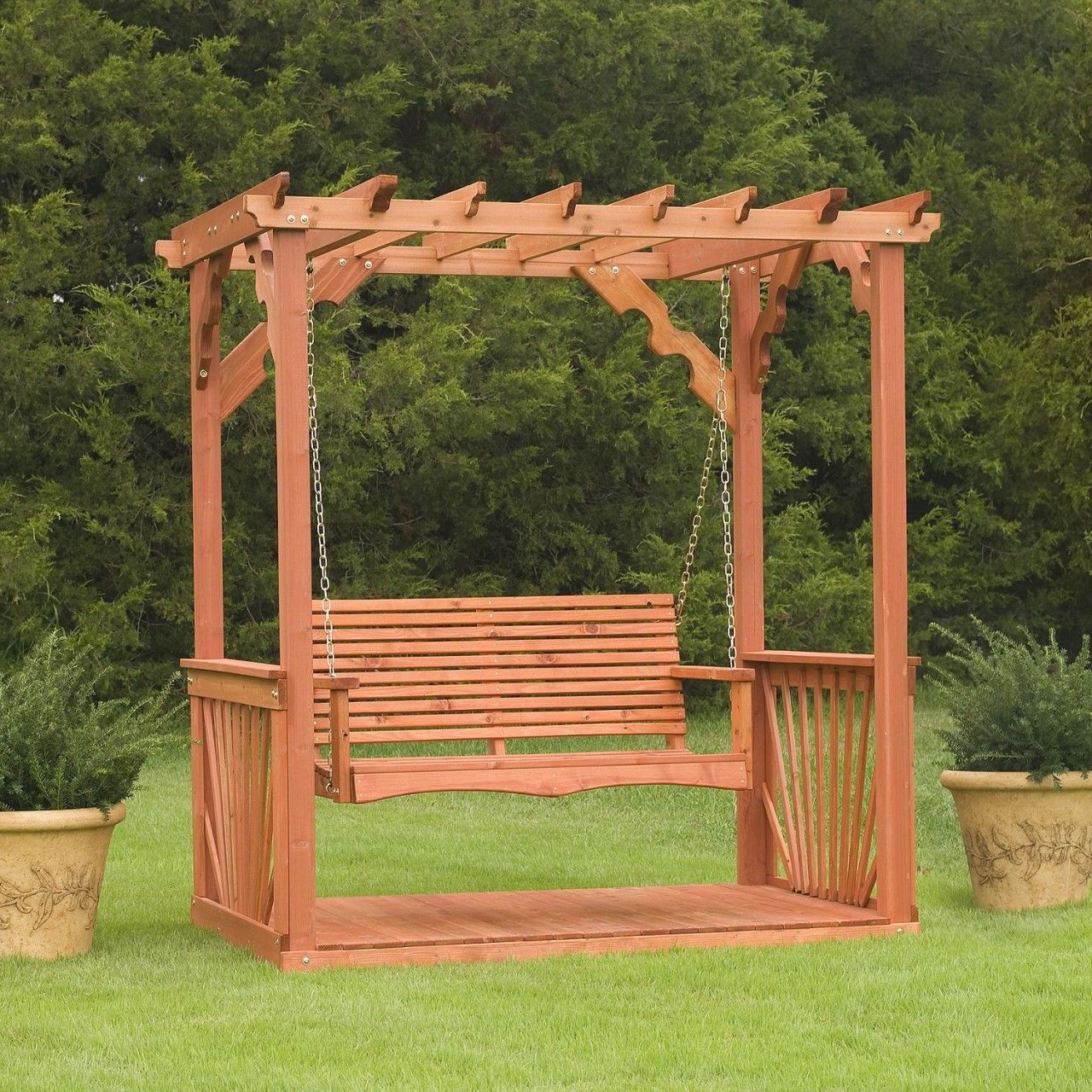 Wooden pergola with swing