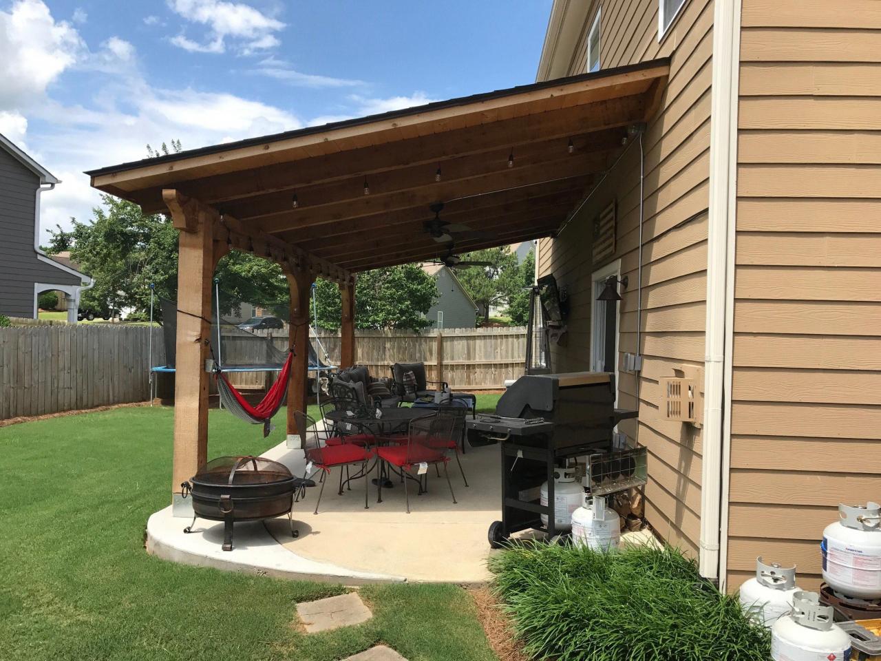 Aluminum pergola attached to house